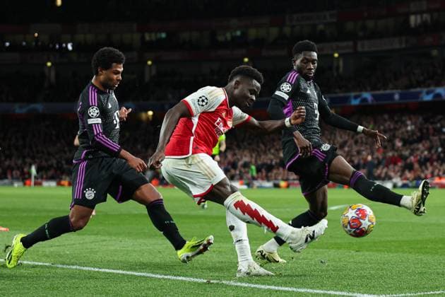 London, England, 9th April 2024. Bukayo Saka of Arsenal crosses the ball during the UEFA Champions League match at the Emirates Stadium, London. Picture credit should read: Kieran Cleeves Sportimage EDITORIAL USE ONLY. No use with unauthorised audio, video, data, fixture lists, club league logos or live services. Online in-match use limited to 120 images, no video emulation. No use in betting, games or single club league player publications. SPI-3065-0079