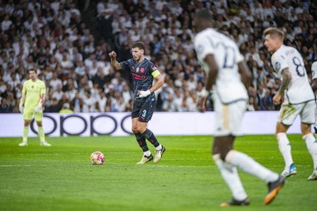 Ruben Dias of Manchester City of Manchester City in action with the ball during the UEFA Champions League quarter-final first leg match between Real Madrid CF and Manchester City at Estadio Santiago Bernabeu on April 9, 2024 in Madrid, Spain.  Copyright: xAlbertoxGardin IPAxSportx xipa-ax xx IPA_45001550 IPA_Agency_IPA45001550