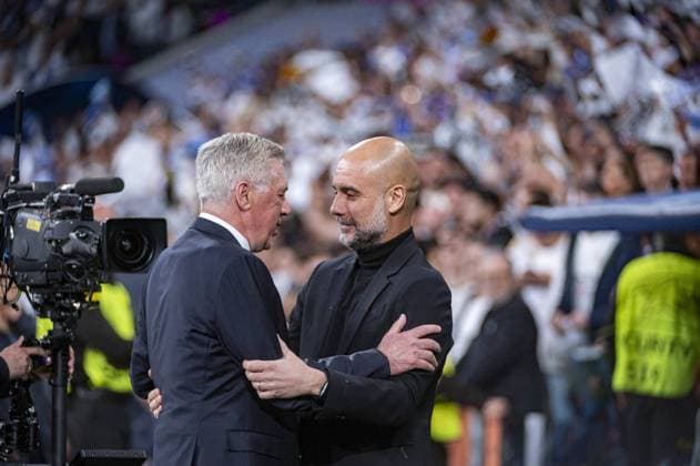 UEFA Champions League football match - Real Madrid vs Manchester City Carlo Ancelotti (L), coach of Real Madrid, hugs Josep Pep Guardiola (R), head coach of Manchester City, before the UEFA Champions League quarter-final first leg match between Real Madrid CF and Manchester City at Estadio Santiago Bernabeu on April 9, 2024 in Madrid, Spain. Madrid Spain  Copyright: xIPAxSport ABACAx