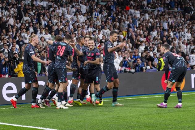 UEFA Champions League football match - Real Madrid vs Manchester City Manchester City players (from L to R) Erling Haaland, Josko Gvardiol, Jack Grealish, Mateo Kovacic, Rodrigo Hernandez Cascante (Rodri) and Phil Foden celebrate the goal of Bernardo Silva of Manchester City during the UEFA Champions League quarter-final first leg match between Real Madrid CF and Manchester City at Estadio Santiago Bernabeu on April 9, 2024 in Madrid, Spain. Madrid Spain  Copyright: xIPAxSport ABACAx