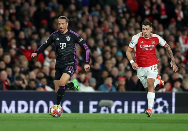 Leroy Sane of Bayern Munich gets away from Jakub Kiwior of Arsenal as he runs into the penalty area and wins a penalty kick Arsenal v Bayern Munich, UEFA Champions League 1 4 Final 1st Leg, Emirates Stadium, Highbury, London, UK - 09 04 2024 Editorial use only  Copyright: xMattxImpey Shutterstockx 14426976bv
