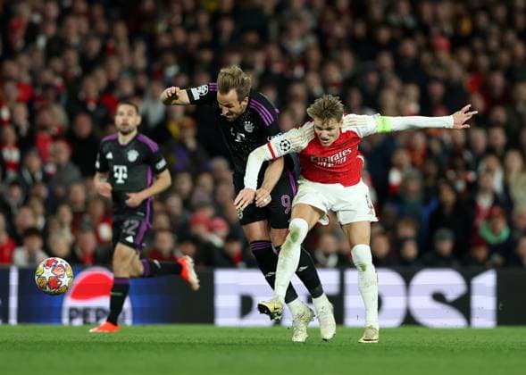 Harry Kane of Bayern Munich is fouled by Martin Odegaard of Arsenal Arsenal v Bayern Munich, UEFA Champions League 1 4 Final 1st Leg, Emirates Stadium, Highbury, London, UK - 09 04 2024 Editorial use only  Copyright: xMattxImpey Shutterstockx 14426976db