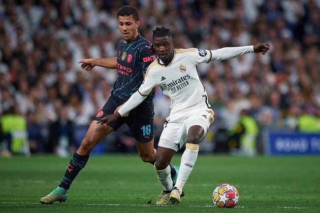 2024-04-09 Real Madrid CF v Manchester City - Quarter-final First Leg - UEFA Champions League 2023 24 MADRID, SPAIN - APRIL 9: Eduardo Camavinga of Real Madrid CF competes for the ball with Rodri of Manchester City during the Quarter-final First Leg - UEFA Champions League match between Real Madrid CF and Manchester City at Estadio Santiago Bernabeu on April 9, 2024 in Madrid, Spain. (Photo by Pablo Morano BSR Agency) Madrid Spain Content not available for redistribution in The Netherlands directly or indirectly through any third parties. Copyright: xBSRxAgencyx