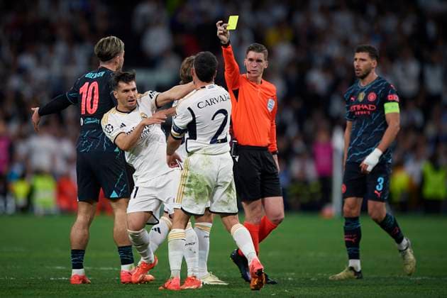 2024-04-09 Real Madrid CF v Manchester City - Quarter-final First Leg - UEFA Champions League 2023 24 MADRID, SPAIN - APRIL 9: Dani Caravajal of Real Madrid CF gets a yellow card during the Quarter-final First Leg - UEFA Champions League match between Real Madrid CF and Manchester City at Estadio Santiago Bernabeu on April 9, 2024 in Madrid, Spain. (Photo by Pablo Morano BSR Agency) Madrid Spain Content not available for redistribution in The Netherlands directly or indirectly through any third parties. Copyright: xBSRxAgencyx