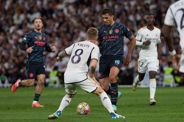 Real Madrid CF v Manchester City: Quarter-final First Leg - UEFA Champions League 2023 24 Rodri from Manchester City is in action with Toni Kroos from Real Madrid during the UEFA Champions League quarter-final first leg match between Real Madrid CF and Manchester City at Estadio Santiago Bernabeu in Madrid, Spain, on April 9, 2024. Madrid Spain  Copyright: xDAXxImagesx originalFilename:daximages-realmadr240409_npGWu.jpg
