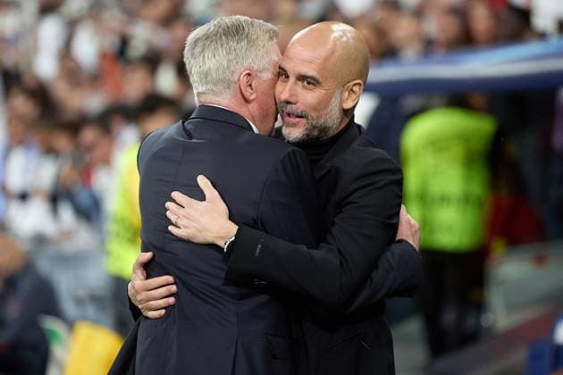 Real Madrid CF v Manchester City: Quarter-final First Leg - UEFA Champions League 2023 24 Carlo Ancelotti of Real Madrid is talking with Pep Guardiola of Manchester City during the UEFA Champions League quarter-final first leg match between Real Madrid CF and Manchester City at Estadio Santiago Bernabeu in Madrid, Spain, on April 9, 2024. Madrid Spain  Copyright: xDAXxImagesx originalFilename:daximages-realmadr240409_npvzS.jpg