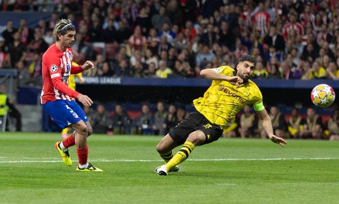 Madrid, Spain, 10th April 2024. Rodrigo De Paul of Athletico Madrid scores the opening goal during the UEFA Champions League match at Wanda Metropolitano, Madrid. Picture credit should read: Paul Terry Sportimage EDITORIAL USE ONLY. No use with unauthorised audio, video, data, fixture lists, club league logos or live services. Online in-match use limited to 120 images, no video emulation. No use in betting, games or single club league player publications. SPI-3067-0016