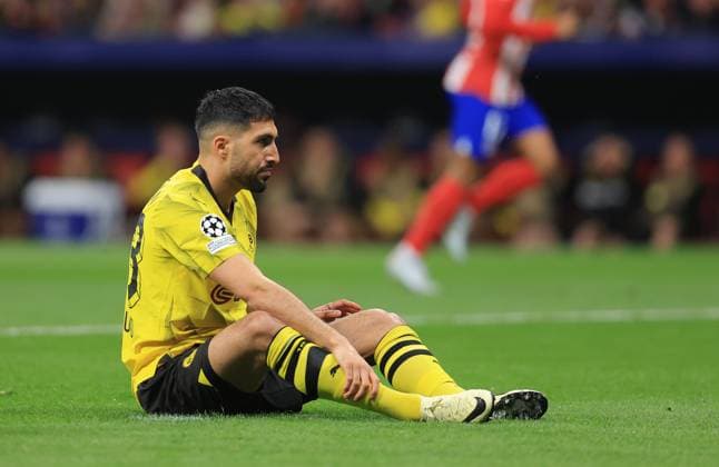 Madrid, Spain, 10th April 2024. Emre Can of Borussia Dortmund reacts after Rodrigo De Paul (not pictured) of Athletico Madrid scores the opening goal during the UEFA Champions League match at Wanda Metropolitano, Madrid. Picture credit should read: Paul Terry Sportimage EDITORIAL USE ONLY. No use with unauthorised audio, video, data, fixture lists, club league logos or live services. Online in-match use limited to 120 images, no video emulation. No use in betting, games or single club league player publications. SPI-3067-0017