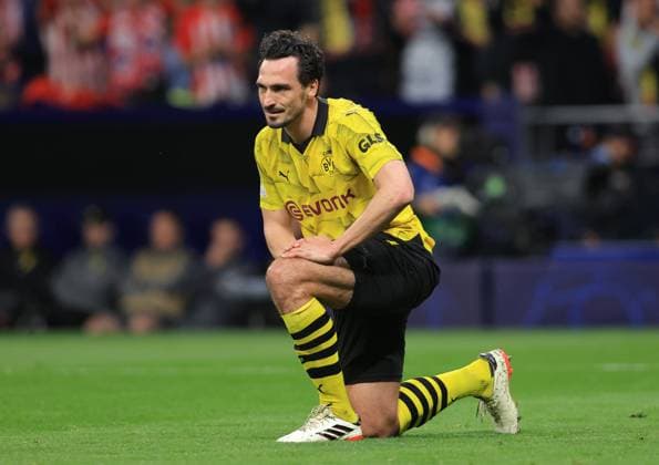 Madrid, Spain, 10th April 2024. Mats Hummels of Borussia Dortmund reacts after Samuel Lino (not pictured) of Athletico Madrid scores to make it 2-0 during the UEFA Champions League match at Wanda Metropolitano, Madrid. Picture credit should read: Paul Terry Sportimage EDITORIAL USE ONLY. No use with unauthorised audio, video, data, fixture lists, club league logos or live services. Online in-match use limited to 120 images, no video emulation. No use in betting, games or single club league player publications. SPI-3067-0023