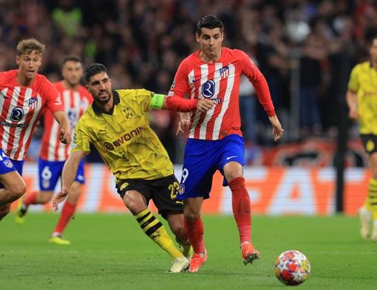 Madrid, Spain, 10th April 2024. Emre Can of Borussia Dortmund and Ãlvaro Morata of Athletico Madrid challenge for the ball during the UEFA Champions League match at Wanda Metropolitano, Madrid. Picture credit should read: Paul Terry Sportimage EDITORIAL USE ONLY. No use with unauthorised audio, video, data, fixture lists, club league logos or live services. Online in-match use limited to 120 images, no video emulation. No use in betting, games or single club league player publications. SPI-3067-0032