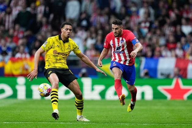 April 10, 2024, Madrid, Madrid, SPAIN: Jorge Resurreccion Koke of Atletico de Madrid and Felix Nmecha of Borussia Dortmund in action during the UEFA Champions League, Quarter finals, football match played between Atletico de Madrid and Borussia Dortmund at Civitas Metropolitano stadium on April 10, 2024, in Madrid, Spain. Madrid SPAIN - ZUMAa181 20240410_zaa_a181_022 Copyright: xOscarxJ.xBarrosox