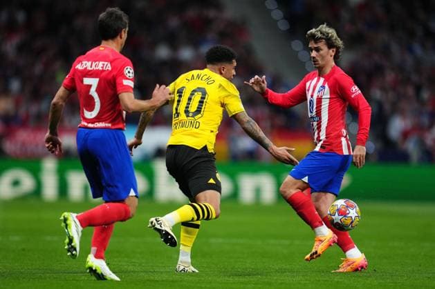 Jadon Sancho of Borussia Dortmund and Antoine Griezmann of Atletico de Madrid Atletico de Madrid v Borussia Dortmund. UEFA Champions League match. Quarter-finals, first leg. Football, Civitas Metropolitano Stadium, Madrid, Spain - 10 April 2024 Editorial use only  Copyright: xBaguxBlanco PRESSINPHOTO Shutterstockx 14430096v