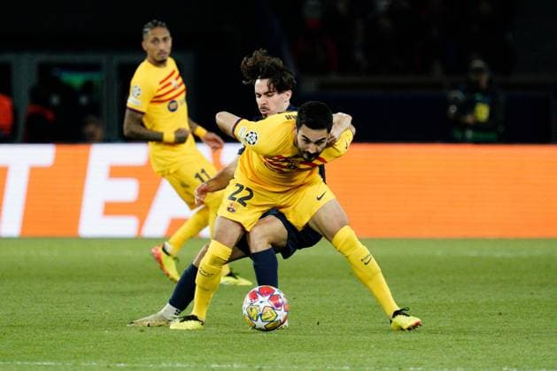 Ilkay Gundogan of Barcelona shields the ball from Vitinha of PSG Paris Saint-Germain v Barcelona, UEFA Champions League, Quarter Final, First Leg, Football, Parc des Princes, Paris, France - 10 Apr 2024 EDITORIAL USE ONLY No use with unauthorised audio, video, data, fixture lists, club league logos or live services. Online in-match use limited to 120 images, no video emulation. No use in betting, games or single club league player publications. Copyright: xDavexWinter Shutterstockx 14424874br