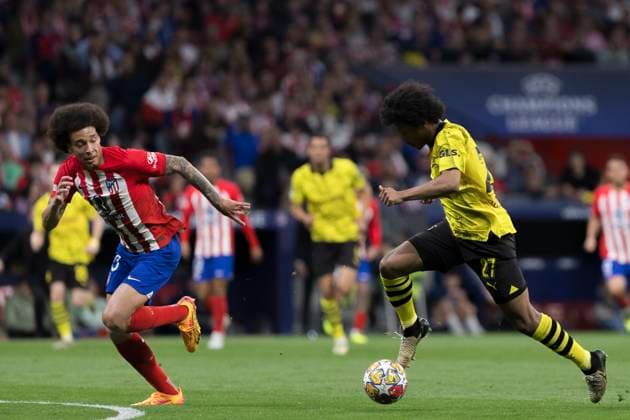 Atletico Madrid v Borussia Dortmund: Quarter-final First Leg - UEFA Champions League 2023 24 Karim Adeyemi of Borussia Dortmund and Axel Witsel of Atletico de Madrid are fighting for the ball during the UEFA Champions League 2023 24 round of 8 first leg match between Atletico de Madrid and Borussia Dortmund at Civitas Metropolitano Stadium in Madrid, Spain, on April 10, 2023. Madrid Spain  Copyright: xGuillermoxMartinezx originalFilename:martinez-uefacham240410_npcgm.jpg