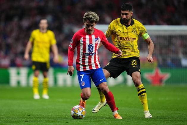 Antoine Griezmann of Atletico de Madrid and Emre Can of Borussia Dortmund Atletico de Madrid v Borussia Dortmund. UEFA Champions League match. Quarter-finals, first leg. Football, Civitas Metropolitano Stadium, Madrid, Spain - 10 April 2024 Editorial use only  Copyright: xBaguxBlanco PRESSINPHOTO Shutterstockx 14430096af