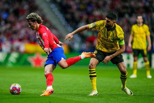 ESP: Atletico de Madrid v Borussia Dortmund. UEFA Champions League match. Quarter-finals Antoine Griezmann of Atletico de Madrid and Emre Can of Borussia Dortmund during the UEFA Champions League match, Quarter-finals, first leg, between Atletico de Madrid and Borussia Dortmund played at Civitas Metropolitano Stadium on April 10, 2024 in Madrid Spain. kpng Copyright: xBaguxBlancox xPRESSINPHOTOx PS_240410_030