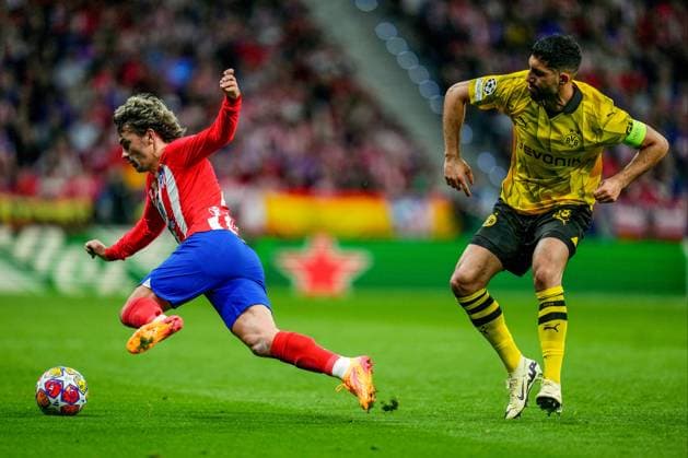 ESP: Atletico de Madrid v Borussia Dortmund. UEFA Champions League match. Quarter-finals Antoine Griezmann of Atletico de Madrid and Emre Can of Borussia Dortmund during the UEFA Champions League match, Quarter-finals, first leg, between Atletico de Madrid and Borussia Dortmund played at Civitas Metropolitano Stadium on April 10, 2024 in Madrid Spain. kpng Copyright: xBaguxBlancox xPRESSINPHOTOx PS_240410_031