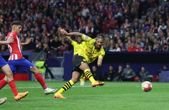 Madrid, Spain, 10th April 2024. Sebastien Haller of Borussia Dortmund scores to make it 2-1 during the UEFA Champions League match at Wanda Metropolitano, Madrid. Picture credit should read: Paul Terry Sportimage EDITORIAL USE ONLY. No use with unauthorised audio, video, data, fixture lists, club league logos or live services. Online in-match use limited to 120 images, no video emulation. No use in betting, games or single club league player publications. SPI-3067-0034