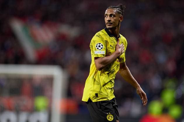 Sebastien Haller of Borussia Dortmund celebrates his goal during the UEFA Champions League 2023 24 quarter-finals match between Atletico de Madrid and Borussia Dortmund at Stadium Civitas Metropolitano on April 10, 2024 in Madrid, Spain. FOOTBALL : Atletico Madrid vs Borussia Dormund - UEFA Ligue des Champions - 1 4 Quart - 10 04 2024 LGM Panoramic 