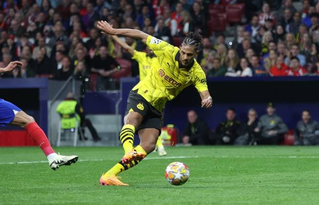 Madrid, Spain, 10th April 2024. Sebastien Haller of Borussia Dortmund scores to make it 2-1 during the UEFA Champions League match at Wanda Metropolitano, Madrid. Picture credit should read: Paul Terry Sportimage EDITORIAL USE ONLY. No use with unauthorised audio, video, data, fixture lists, club league logos or live services. Online in-match use limited to 120 images, no video emulation. No use in betting, games or single club league player publications. SPI-3067-0036