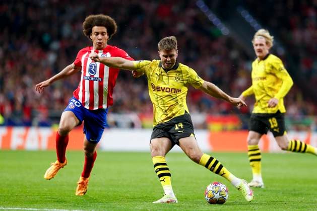 April 10, 2024, Madrid, Madrid, SPAIN: Axel Witsel of Atletico de Madrid and Niclas Fullkrug of Borussia Dortmund in action during the UEFA Champions League, Quarter finals, football match played between Atletico de Madrid and Borussia Dortmund at Civitas Metropolitano stadium on April 10, 2024, in Madrid, Spain. Madrid SPAIN - ZUMAa181 20240410_zaa_a181_069 Copyright: xIrinaxR.xHipolitox