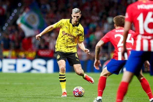 April 10, 2024, Madrid, Madrid, SPAIN: Nico Schlotterbeck of Borussia Dortmund in action during the UEFA Champions League, Quarter finals, football match played between Atletico de Madrid and Borussia Dortmund at Civitas Metropolitano stadium on April 10, 2024, in Madrid, Spain. Madrid SPAIN - ZUMAa181 20240410_zaa_a181_095 Copyright: xIrinaxR.xHipolitox