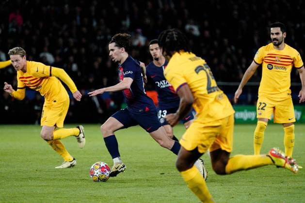 Vitinha of PSG drives forward Paris Saint-Germain v Barcelona, UEFA Champions League, Quarter Final, First Leg, Football, Parc des Princes, Paris, France - 10 Apr 2024 EDITORIAL USE ONLY No use with unauthorised audio, video, data, fixture lists, club league logos or live services. Online in-match use limited to 120 images, no video emulation. No use in betting, games or single club league player publications. Copyright: xDavexWinter Shutterstockx 14424874jy