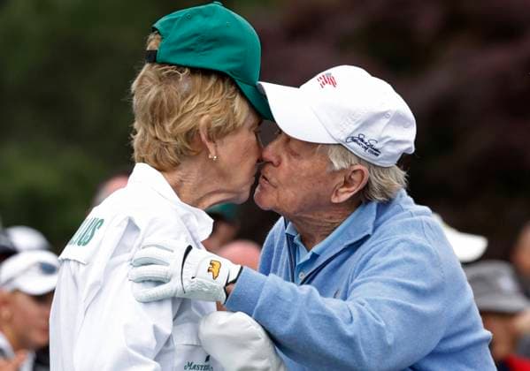 Honorary starter Jack Nicklaus kisses his wife Barbara before teeing off on the first hole before the first round of the Masters Tournament at Augusta National Golf Club in Augusta, Georgia on Thursday, April 11, 2024.  AUG20240411105 JOHNxANGELILLO