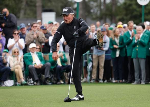 Honorary starter Gary Player does his signature kick after teeing off on the first hole before the first round of the Masters Tournament at Augusta National Golf Club in Augusta, Georgia on Thursday, April 11, 2024.  AUG20240411506 TANNENxMAURY