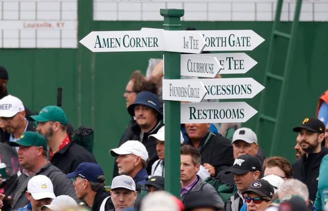 Crowds of golf enthusiasts walk past the scoreboard before the first round of the Masters Tournament at Augusta National Golf Club in Augusta, Georgia on Thursday, April 11, 2024.  AUG20240411112 JOHNxANGELILLO