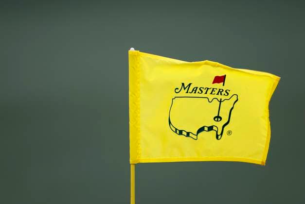 A Masters flag blows in the wind on the second hole during the first round of the Masters Tournament at Augusta National Golf Club in Augusta, Georgia on Thursday, April 11, 2024.  AUG20240411511 TANNENxMAURY
