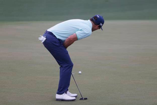 Zach Johnson reacts as he misses a putt on the second hole during the first round of the Masters Tournament at Augusta National Golf Club in Augusta, Georgia on Thursday, April 11, 2024.  AUG20240411513 TANNENxMAURY