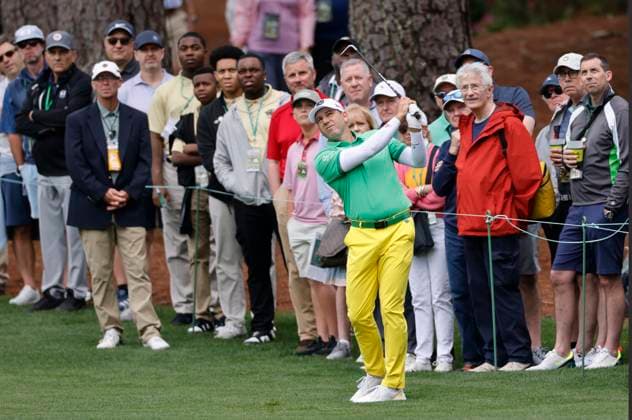 Spain s Sergio Garcia watches the ball as he hits a chip shot to the green on the second hole during the first round of the Masters Tournament at Augusta National Golf Club in Augusta, Georgia on Thursday, April 11, 2024.  AUG20240411516 TANNENxMAURY