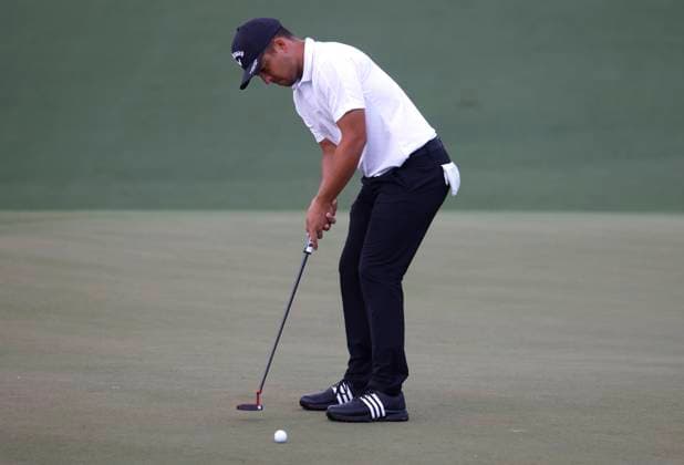 Xander Schauffele putts on the second hole during the first round of the Masters Tournament at Augusta National Golf Club in Augusta, Georgia on Thursday, April 11, 2024.  AUG20240411555 TANNENxMAURY