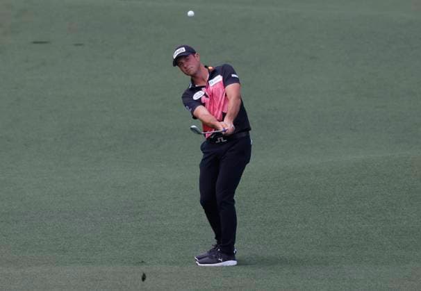 Sweden s Viktor Hovland hits his approach shot to the green on the second hole during the first round of the Masters Tournament at Augusta National Golf Club in Augusta, Georgia on Thursday, April 11, 2024.  AUG20240411560 TANNENxMAURY