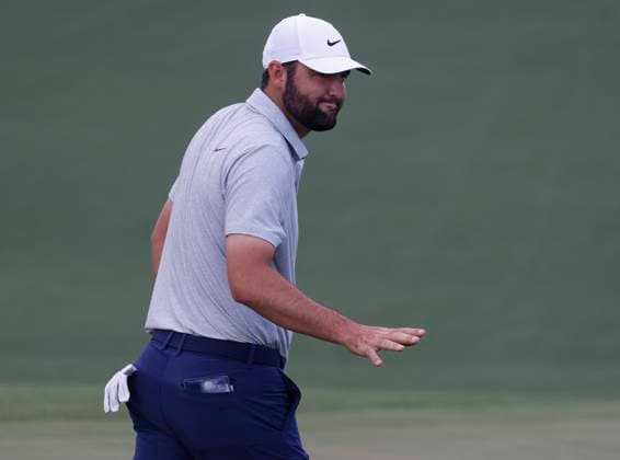 Scottie Scheffler reacts after putting on the second hole during the first round of the Masters Tournament at Augusta National Golf Club in Augusta, Georgia on Thursday, April 11, 2024.  AUG20240411561 TANNENxMAURY