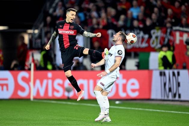 LEVERKUSEN - (l-r) Alejandro Grimaldo of Bayer 04 Leverkusen, Vladimir Coufal of West Ham United FC during the UEFA Europa League quarter-final match between Bayer 04 Leverkusen and West Ham United at the BayArena on April 11, 2024 in Leverkusen, Germany. ANP Hollandse Hoogte UEFA Europa League 2023 24 2023 2024 xVIxANPxSportx xGerritxvanxKeulenxIVx 495762923 originalFilename: 495762923.jpg