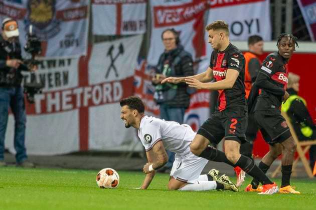 Football UEFA Europa League, season 2023 2024, quarter-final, first leg, Bayer 04 Leverkusen West Ham United on 11 04 2024 at the BayArena in Leverkusen duel between Josip Stanisic Bayer 04 Leverkusen, 02 and Lucas Paqueta West Ham United, 10 Jeremie Frimpong Bayer 04 Leverkusen, 30 Photo Kirchner Media TH Copyright: xKirchner-Media THx
