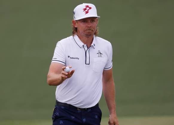 Australia s Cameron Smith sinks a putt on the second hole during the first round of the Masters Tournament at Augusta National Golf Club in Augusta, Georgia on Thursday, April 11, 2024.  AUG20240411568 TANNENxMAURY