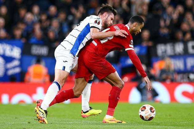 Berat Djimsiti of Atalanta battles with Cody Gakpo of Liverpool Liverpool v Atalanta, UEFA Europa League, Quarter Final, First Leg, Football, Anfield, Liverpool, UK - 11 Apr 2024 EDITORIAL USE ONLY No use with unauthorised audio, video, data, fixture lists, club league logos or live services. Online in-match use limited to 120 images, no video emulation. No use in betting, games or single club league player publications. Copyright: xMattxWest Shutterstockx 14424886aj