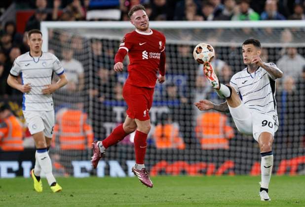 Liverpool FC v Atalanta: Quarter-Final First Leg - UEFA Europa League 2023 24 Alexis Mac Allister of Liverpool and Gianluca Scamacca of Atalanta challenge during the UEFA Europa League 2023 24 Quarter-Final first leg match between Liverpool FC and Atalanta at Anfield on April 11, 2024 in Liverpool, England. Liverpool Anfield England United Kingdom Copyright: xRichardxSellers Sportsphoto APLx 13971877