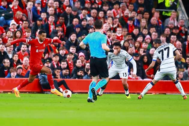 Cody Gakpo (Liverpool) runs through the Atalanta defence , UEFA Europa League 2023 2024 - Quarter-finals First Leg, Liverpool FC vs Atalanta, Anfield, April 11, 2024, Liverpool, United Kingdom.