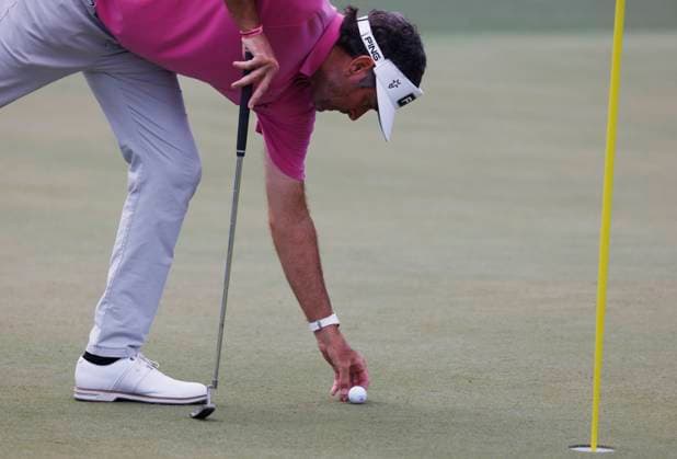 Bubba Watson prepares to putt on the second hole during the first round of the Masters Tournament at Augusta National Golf Club in Augusta, Georgia on Thursday, April 11, 2024.  AUG20240411581 TANNENxMAURY