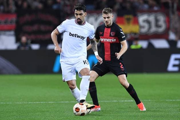 Soccer Europa League quarter-final Bayer 04 Leverkusen FC West Ham United on 11 04 2024 at the BayArena in Leverkusen Lucas Paqueta West Ham , front Josip Stanisic Leverkusen , back xRx