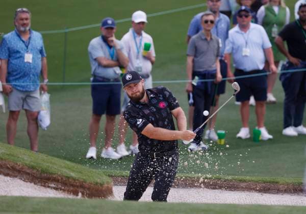 Golf, PGA, Masters Tournament in Augusta England s Tyrrell Hatton hits out of a bunker on the second hole during the first round of the Masters Tournament at Augusta National Golf Club in Augusta, Georgia on Thursday, April 11, 2024.  AUG20240411588 TANNENxMAURY