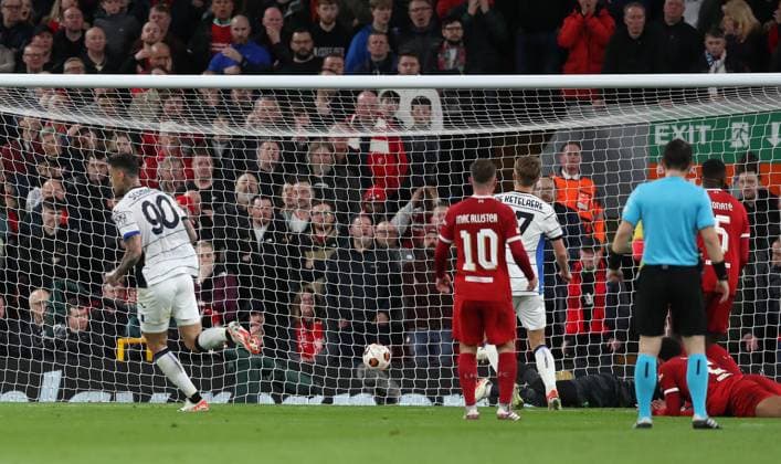 11th April 2024; Anfield, Liverpool, Merseyside, England; Europa League, Quarter Final;, First Leg Football, Liverpool versus Atalanta; Gianluca Scamacca of Atalanta beats Caoimhin Kelleher of Liverpool to give his side a 0-1 lead after 39 minutes  ActionPlus12628479 DavidxBlunsden