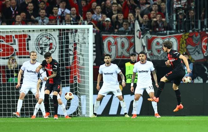 Jonas Hofmann of Beyern Leverkusen scores the opening goal Bayer 04 Leverkusen v West Ham United, UEFA Europa League, Quarter Final, First Leg, Football, BayArena, Leverkusen, Germany - 11 Apr 2024 EDITORIAL USE ONLY No use with unauthorised audio, video, data, fixture lists, club league logos or live services. Online in-match use limited to 120 images, no video emulation. No use in betting, games or single club league player publications.  Copyright: xMichaelxZemanek Shutterstockx 14424882ad