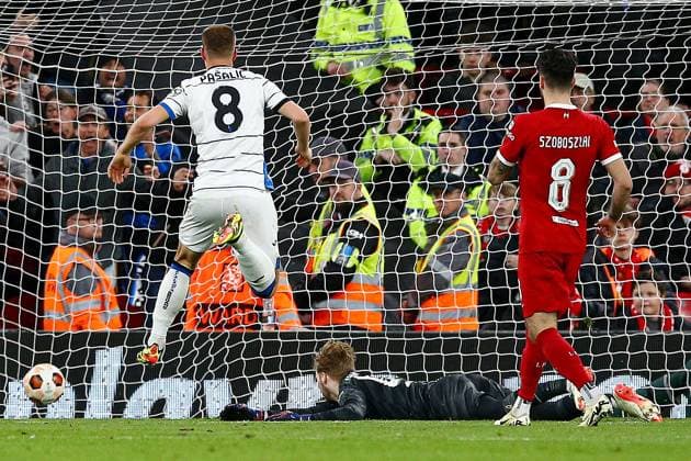 Mario Pasalic of Atalanta scores a goal for their side to make it 3-0 Liverpool v Atalanta, UEFA Europa League, Quarter Final, First Leg, Football, Anfield, Liverpool, UK - 11 Apr 2024 EDITORIAL USE ONLY No use with unauthorised audio, video, data, fixture lists, club league logos or live services. Online in-match use limited to 120 images, no video emulation. No use in betting, games or single club league player publications.  Copyright: xMattxWest Shutterstockx 14424886bx