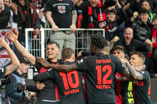 Football UEFA Europa League, season 2023 2024, quarter-final, first leg, Bayer 04 Leverkusen West Ham United on 11 04 2024 at the BayArena in Leverkusen The Leverkusen players, Granit Xhaka Bayer 04 Leverkusen, 34 , Florian Wirtz Bayer 04 Leverkusen, 10 , Edmond Tapsoba Bayer 04 Leverkusen, 12 and Alejandro Grimaldo Bayer 04 Leverkusen, 20 celebrate the goal for 1 0 Photo Kirchner Media TH Copyright: xKirchner-Media THx