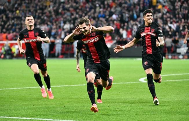 Football, Europa League, Germany, Men, 2023 2024 season, Quarter-final first leg, BayArena Leverkusen, Bayer Leverkusen FC West Ham United Jonas Hofmann LEV cheers after his goal for 1 0, together with Alejandro Grimaldo LEV and Piero Hincapie LEV cheers, joy, action UEFA REGULATIONS PROHIBIT ANY USE OF PHOTOGRAPHS AS IMAGE SEQUENCES AND OR QUASI VIDEO